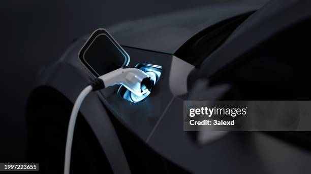 electric car charging - elektrische auto stockfoto's en -beelden