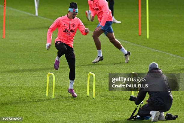 Manchester City's English midfielder Phil Foden attends a training session at Manchester City's training ground in north-west England on February 12...