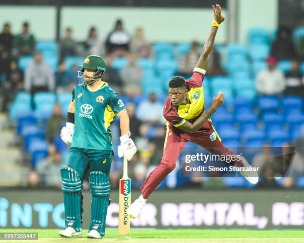 Alzarri Joseph of the West Indies sends down a delivery during game one of the Men's T20 International series between Australia and West Indies at...