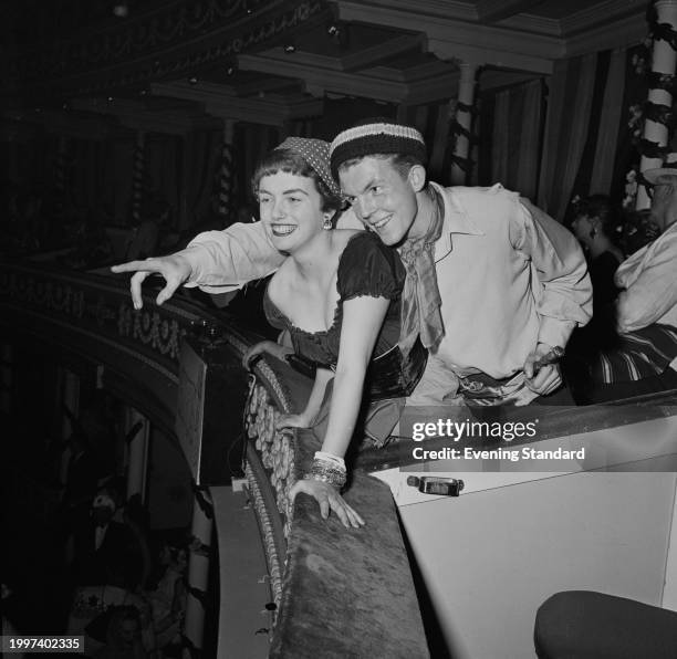 Jenny Brain and Edward Jackson clothed in fancy dress at the Chelsea Arts Ball, Royal Albert Hall, London, December 31st 1956.