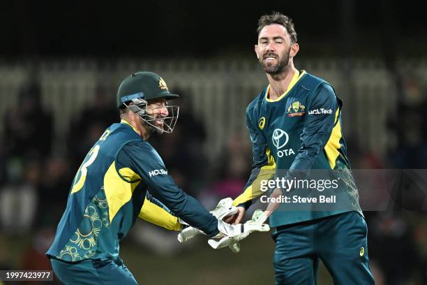 Glenn Maxwell of Australia celebrates the wicket of Rovman Powell of the West Indies during game one of the Men's T20 International series between...