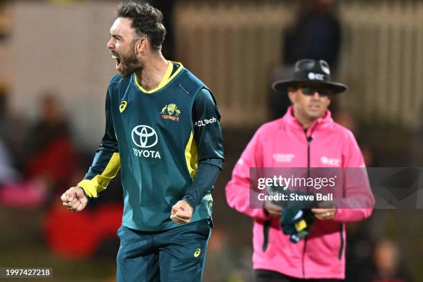 Glenn Maxwell of Australia celebrates the wicket of Rovman Powell of the West Indies during game one of the Men's T20 International series between...