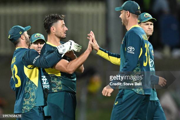 Marcus Stoinis of Australia celebrates the wicket of Shai Hope of the West Indies during game one of the Men's T20 International series between...