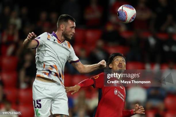 Aleksandar Susnjar of Perth Glory and Hiroshi Ibusuki of Adelaide United contest the ball during the A-League Men round 16 match between Adelaide...
