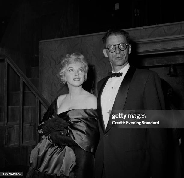 Actress Marilyn Monroe with her husband, playwright Arthur Miller visiting the first night of Miller's play 'A View from the Bridge', Comedy Theatre,...