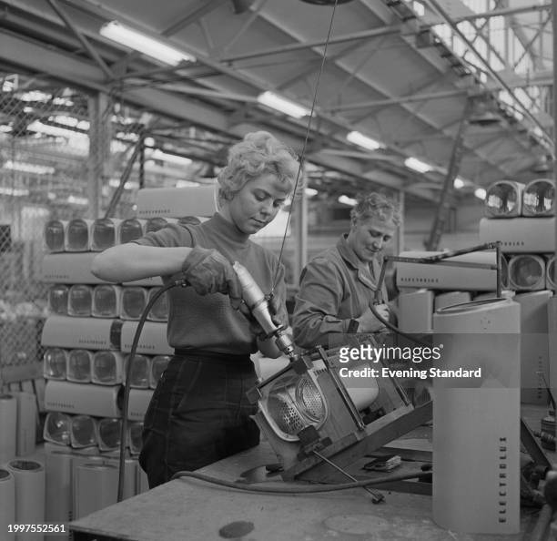 Workers at the Electrolux appliance factory, Luton, Bedfordshire, January 22nd 1957.