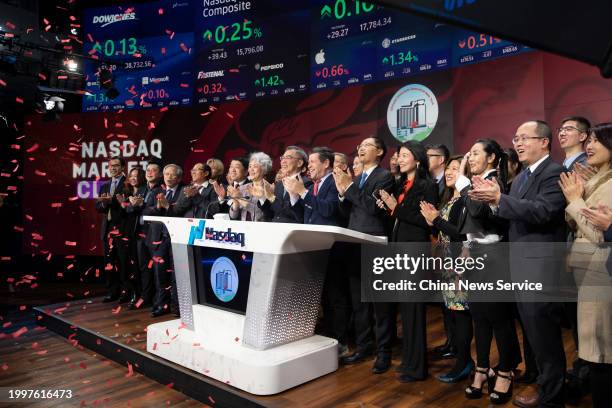 Chinese Consul General in New York Huang Ping and his wife Zhang Aiping participate in a closing bell ceremony to celebrate the Chinese New Year, the...