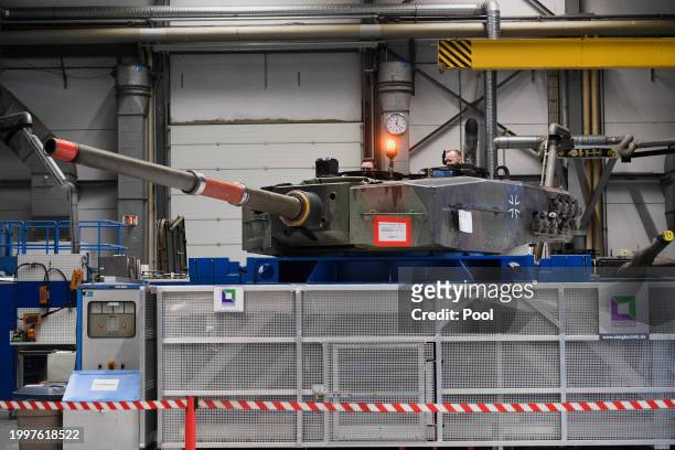 View of a Leopard 2 tank at a production line as German Chancellor Olaf Scholz and Defence Minister Boris Pistorius attend the groundbreaking...