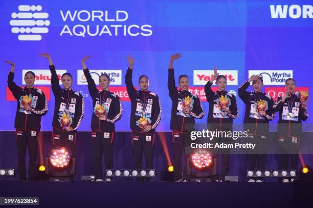 Silver medallists Moe Higa, Ami Wada, Moeka Kijima, Akane Yanagisawa, Uta Kobayashi, Mashiro Yasunaga, Tomoka Sato and Megumu Yoshida of Team Japan...