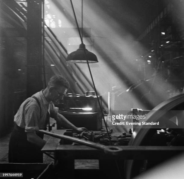 Worker in the body shop at BMC's Austin Longbridge car plant, Birmingham, June 26th 1957.
