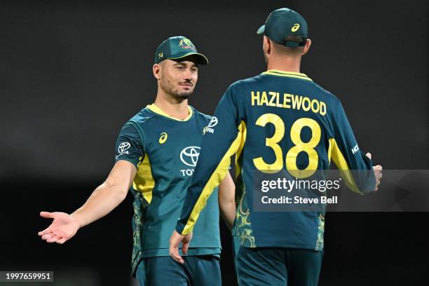 Marcus Stoinis and Josh Hazlewood of Australia celebrate the win during game one of the Men's T20 International series between Australia and West...