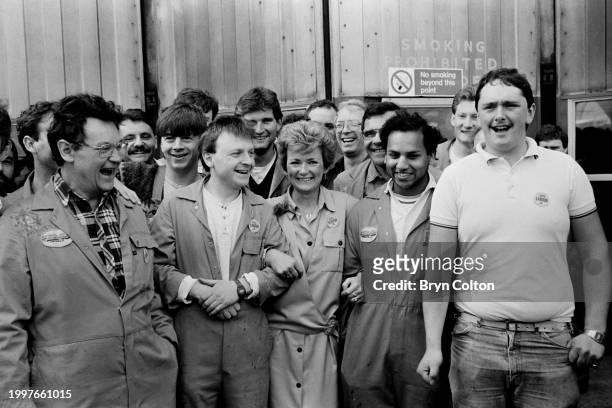Glenys Kinnock , wife of Neil Kinnock Leader of the Labour Party, with workers from British Aerospace while on the campaign trail for the 1987 UK...