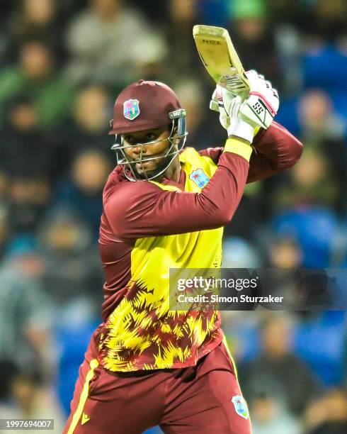 Romario Shepherd of the West Indies drives through the coversduring game one of the Men's T20 International series between Australia and West Indies...