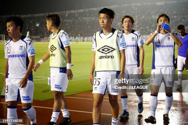 Gamba Osaka players react after the 2-2 draw in the J.League J1 match between Sanfrecce Hiroshima and Gamba Osaka at Edion Stadium Hiroshima on...