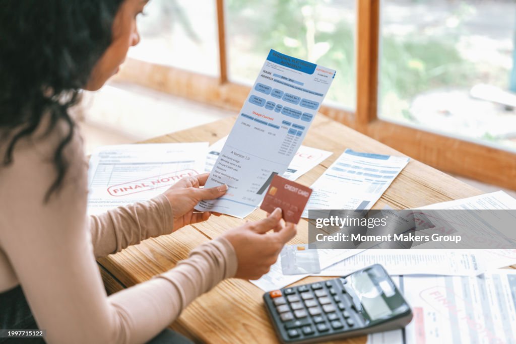 Stressed young woman has financial problems credit card debt to pay crucial