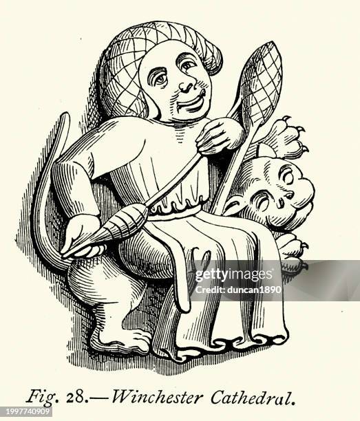 woman spinning thread or yarn, cat, medieval wood carving from a church stall,  winchester cathedral - 665409969 or 665409803 stock illustrations