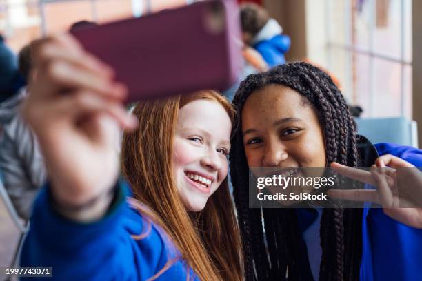 smiley selfies - teens taking selfies stock pictures, royalty-free photos & images