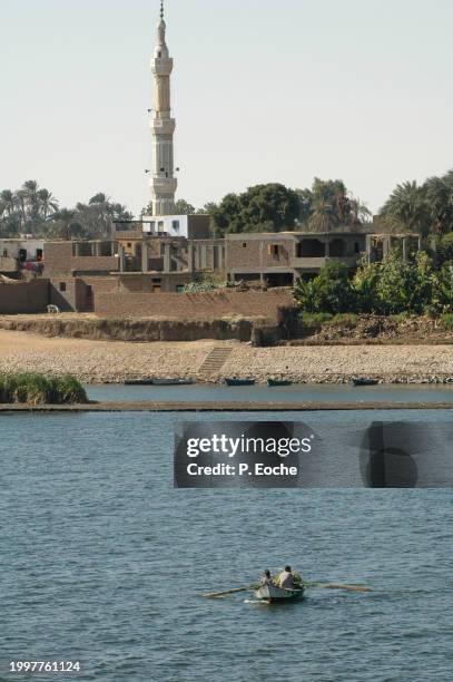 egypt, village and mosque, rural life on the banks of the nile - transport nautique stock pictures, royalty-free photos & images