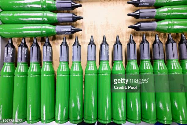 Ammunition is seen at a production line as German Chancellor Olaf Scholz and Defence Minister Boris Pistorius attend the groundbreaking ceremony for...