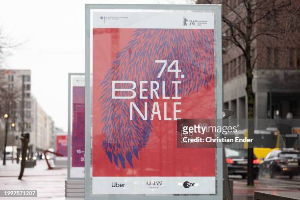 Cars drive past posters for the 2024 Berlinale Berlin International Film Festival ahead of the 74th Berlinale International Film Festival Berlin on...