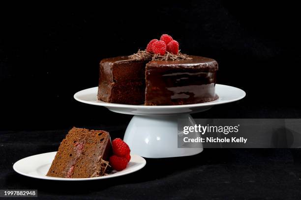 slice of chocolate raspberry cake - sachertorte stock pictures, royalty-free photos & images