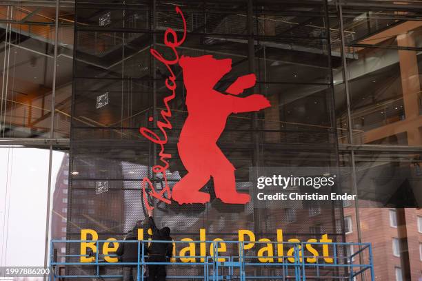 Workers set up the Berlinale bear logo outside of the Berlinale Palace venue ahead of the 74th Berlinale International Film Festival Berlin on...