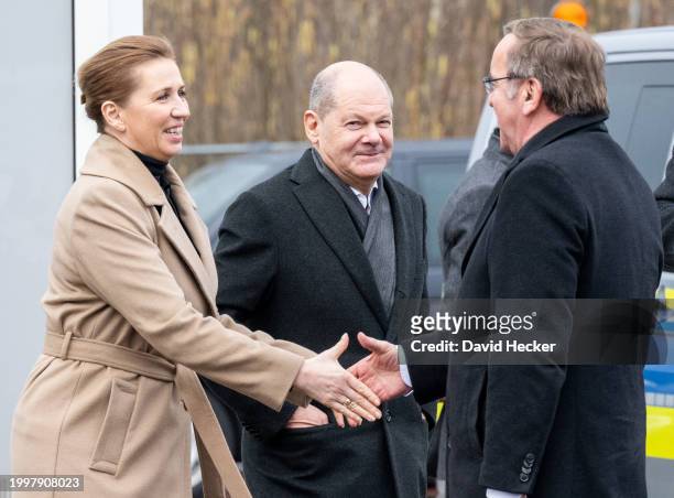 Danish Prime Minister Mette Frederiksen and German Defence Minister Boris Pistorius greet each other attended by German Chancellor Olaf Scholz after...