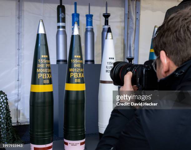 Photographer takes pictures of artillery ammunition before the groundbreaking ceremony for a new munitions factory of German defence contractor...