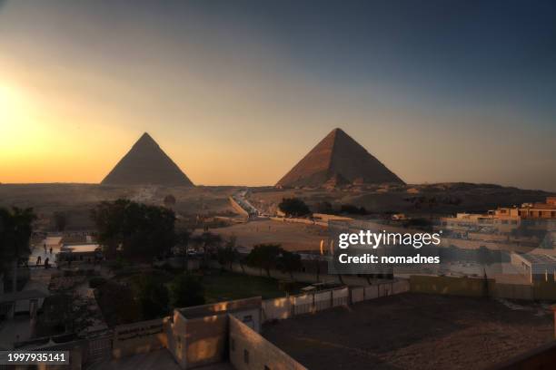 the great pyramid of giza and sunset sky, egypt travel destination. - giza pyramids stock pictures, royalty-free photos & images