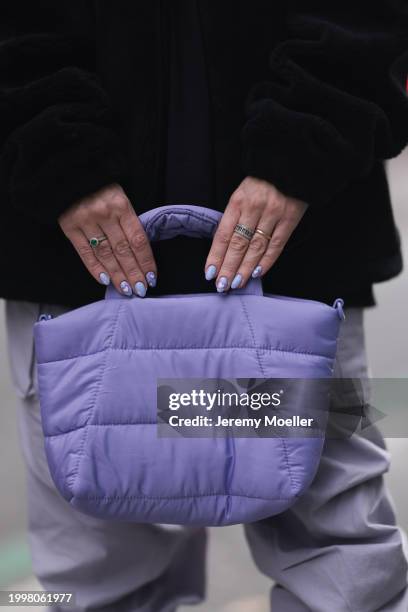 Palina Kozyrava seen wearing Vertere black logo patch fleece jacket, Vertere black logo print pattern cotton t-shirt, pastel purple nylon cargo...
