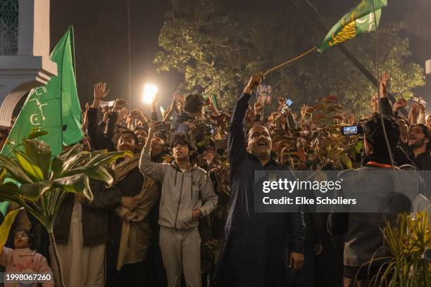 People celebrate a speech by former Prime Minister of Pakistan, Nawaz Sharif, at the party office of Pakistan Muslim League , at Model Town in Lahore...