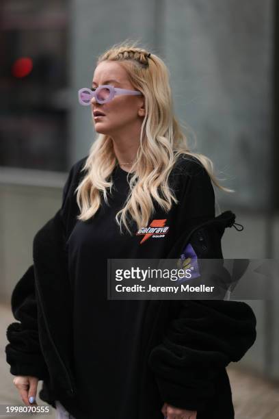 Palina Kozyrava seen wearing purple transparent sunglasses, Vertere black logo patch fleece jacket, Vertere black logo print pattern cotton t-shirt,...