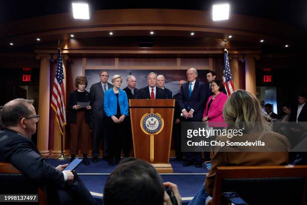 Senate Minority Whip Richard Durbin talks to reporters with Sen. Tina Smith , Sen. Jeff Merkley , Sen. Elizabeth Warren , Sen. Tim Kaine , Sen. Chris...