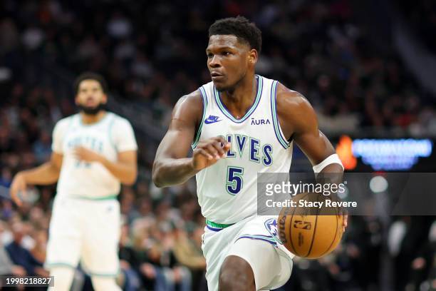 Anthony Edwards of the Minnesota Timberwolves handles the ball during a game against the Milwaukee Bucks at Fiserv Forum on February 08, 2024 in...