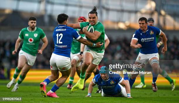 Dublin , Ireland - 11 February 2024; James Lowe of Ireland is tackled by Tommaso Menoncello of Italy during the Guinness Six Nations Rugby...