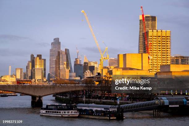 City of London skyline view looking over the River Thames and Waterloo Bridge and the South Bank at sunset on 10th February 2024 in London, United...