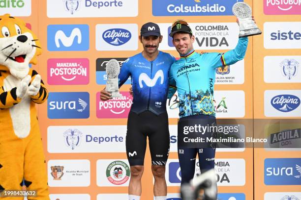 Second place Fernando Gaviria of Colombia and Movistar Team and stage winner Mark Cavendish of The United Kingdom and Astana Qazaqstan Team celebrate...