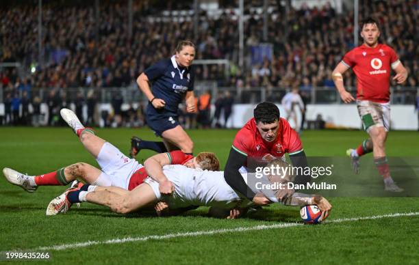 Archie McParland of England scores his side's second try during the U20 Six Nations match between England and Wales at The Recreation Ground on...