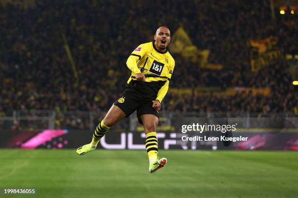 Donyell Malen of Dortmund celebrates scoring the first team goal during the Bundesliga match between Borussia Dortmund and Sport-Club Freiburg at...