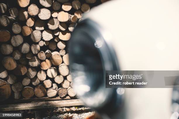 logs in wood store - vehicle light stock pictures, royalty-free photos & images