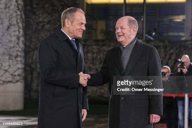 German Chancellor Olaf Scholz welcomes Polish Prime Minister Donald Tusk as he arrives for talks at the Chancellery on February 12, 2024 in Berlin,...