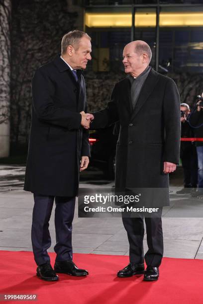 German Chancellor Olaf Scholz welcomes Polish Prime Minister Donald Tusk as he arrives for talks at the Chancellery on February 12, 2024 in Berlin,...