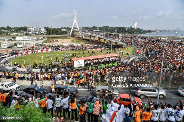 Ivory Coast players, winners of the 2024 African Cup of Nations , parade in a truck in Abidjan, on February 12, 2024.
