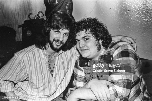 American promoter Billy Cohen poses with Rock musician John Popper, of the band Blues Traveler, backstage stage at the 712 Club, New York, New York,...