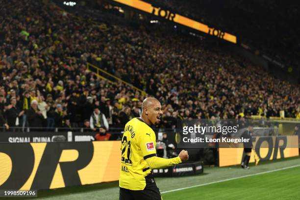 Donyell Malen of Dortmund celebrates scoring the 2nd team goal during the Bundesliga match between Borussia Dortmund and Sport-Club Freiburg at...