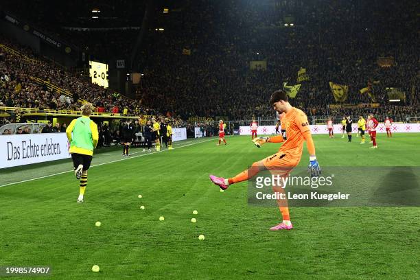 Gregor Kobel, keeper of Dortmund kicks a tennisball during the Bundesliga match between Borussia Dortmund and Sport-Club Freiburg at Signal Iduna...