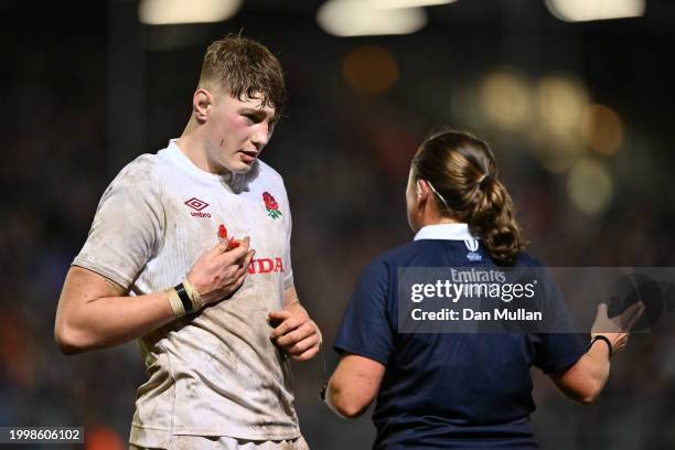 Finn Carnduff of England talks with Referee, Aimee Barrett-Theron during the U20 Six Nations match between England and Wales at The Recreation Ground...