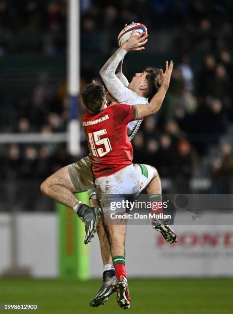 Ioan Jones of England competes for the high ball with Huw Anderson of Wales during the U20 Six Nations match between England and Wales at The...