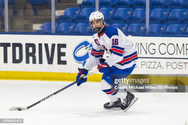 Logan Hensler of Team USA skates with the puck during U18 Five Nations Tournament between Team Switzerland and Team USA at USA Hockey Arena on...