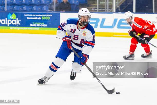 Lucas Van Vliet of Team USA skates with the puck during U18 Five Nations Tournament between Team Switzerland and Team USA at USA Hockey Arena on...